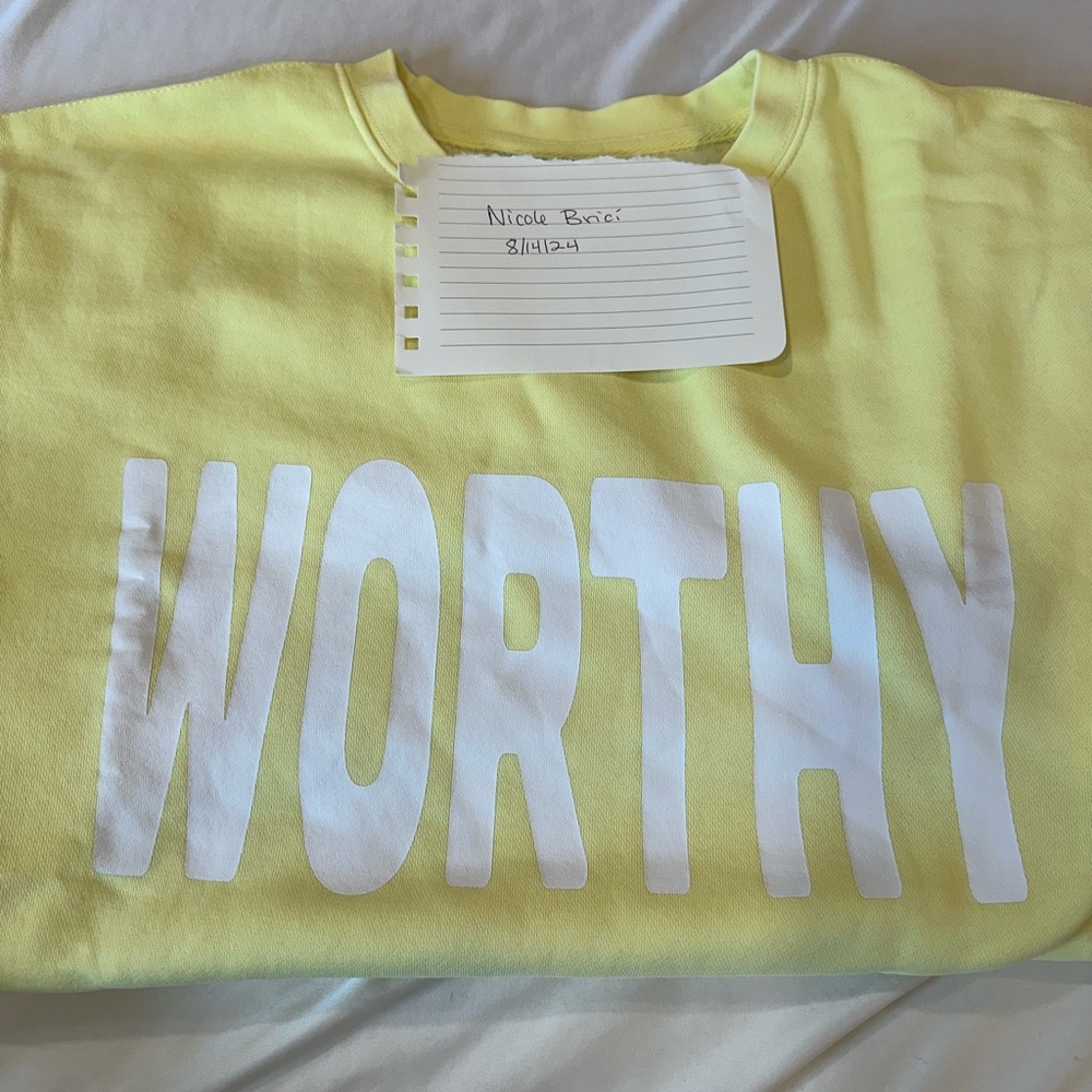 Living Fully Co. “worthy” size medium. New never washed.